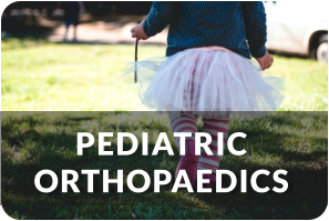 A toddler girl walking away wearing pink sotckings, a tutu, and a jean jacket. Title reads; Pediatric Orthopaedics