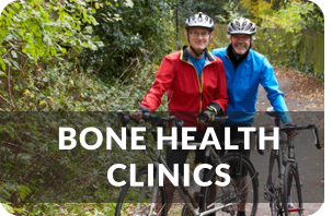 A senior couple stands next to bicycles on a path in the woods. Title reads: Bone Health Clinic